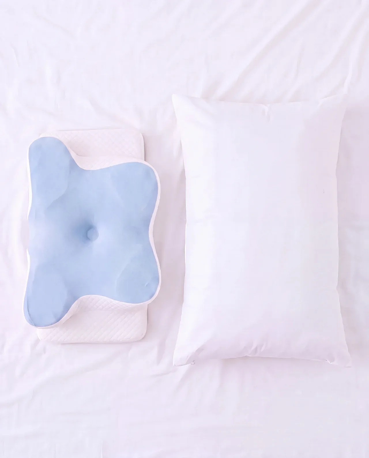 Rest Well pillow next to a regular pillow