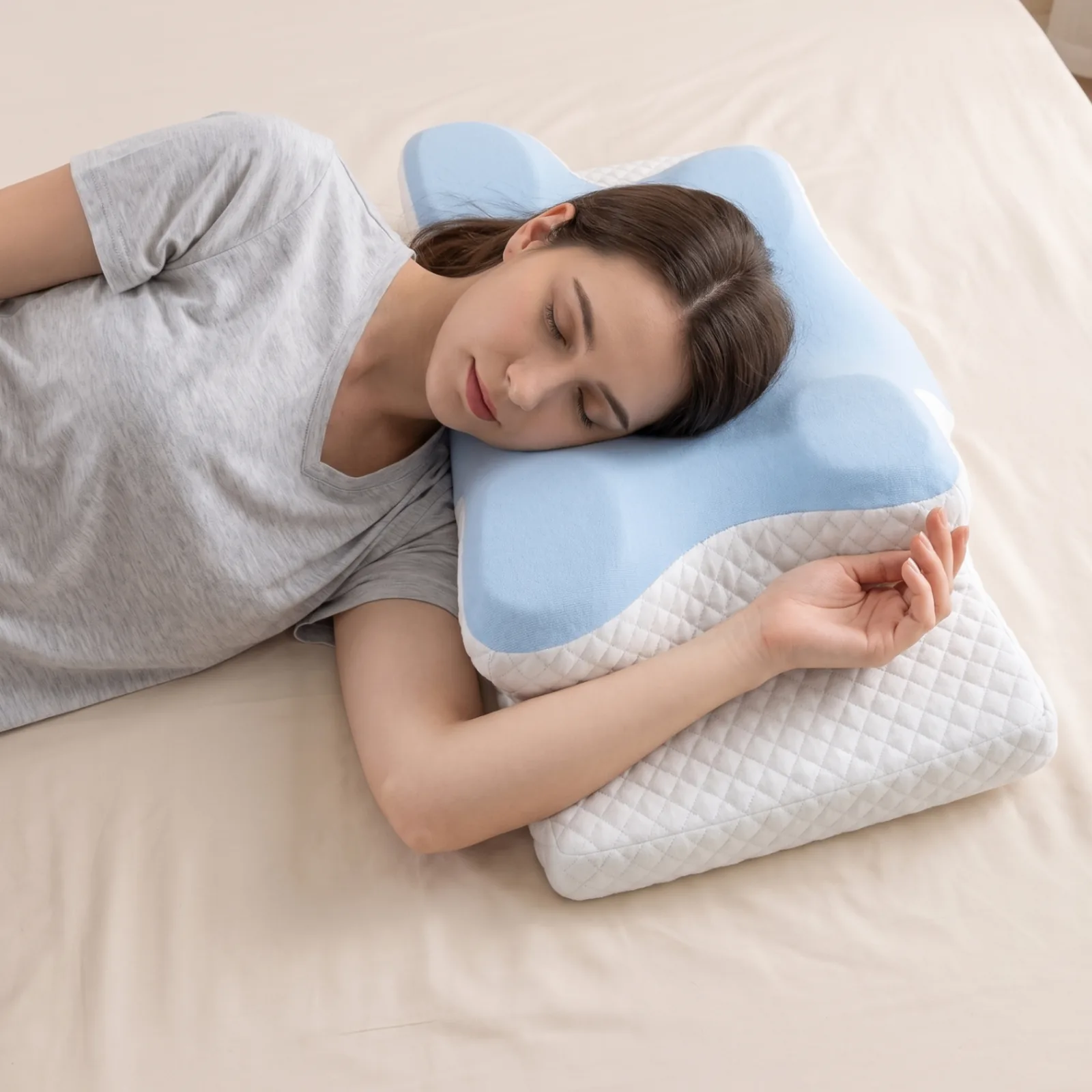 Woman sleeping on her side with the Rest Well pillow